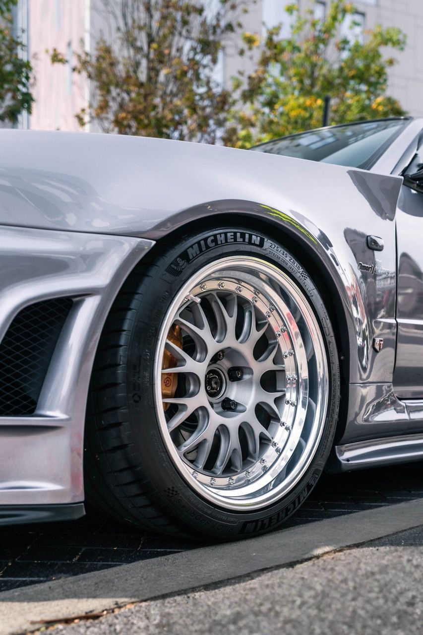R34 GTR with Motivo Forged CS-E custom wheels in frozen brushed gunmetal face and gloss polished clear lip side view — view 5