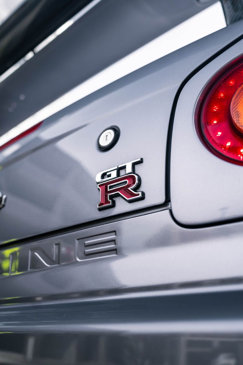 R34 GTR with Motivo Forged CS-E custom wheels in frozen brushed gunmetal face and gloss polished clear lip side view — view 36
