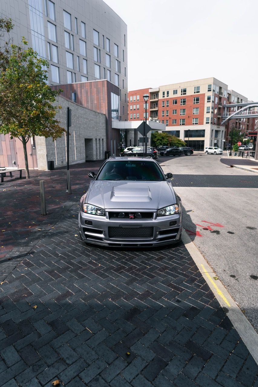 R34 GTR with Motivo Forged CS-E custom wheels in frozen brushed gunmetal face and gloss polished clear lip side view — view 48