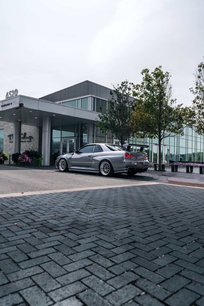 R34 GTR with Motivo Forged CS-E custom wheels in frozen brushed gunmetal face and gloss polished clear lip side view — view 32