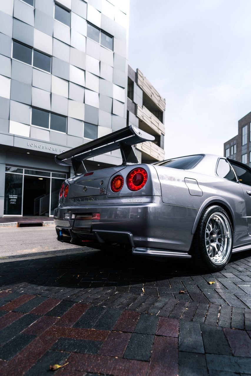 R34 GTR with Motivo Forged CS-E custom wheels in frozen brushed gunmetal face and gloss polished clear lip side view — view 12