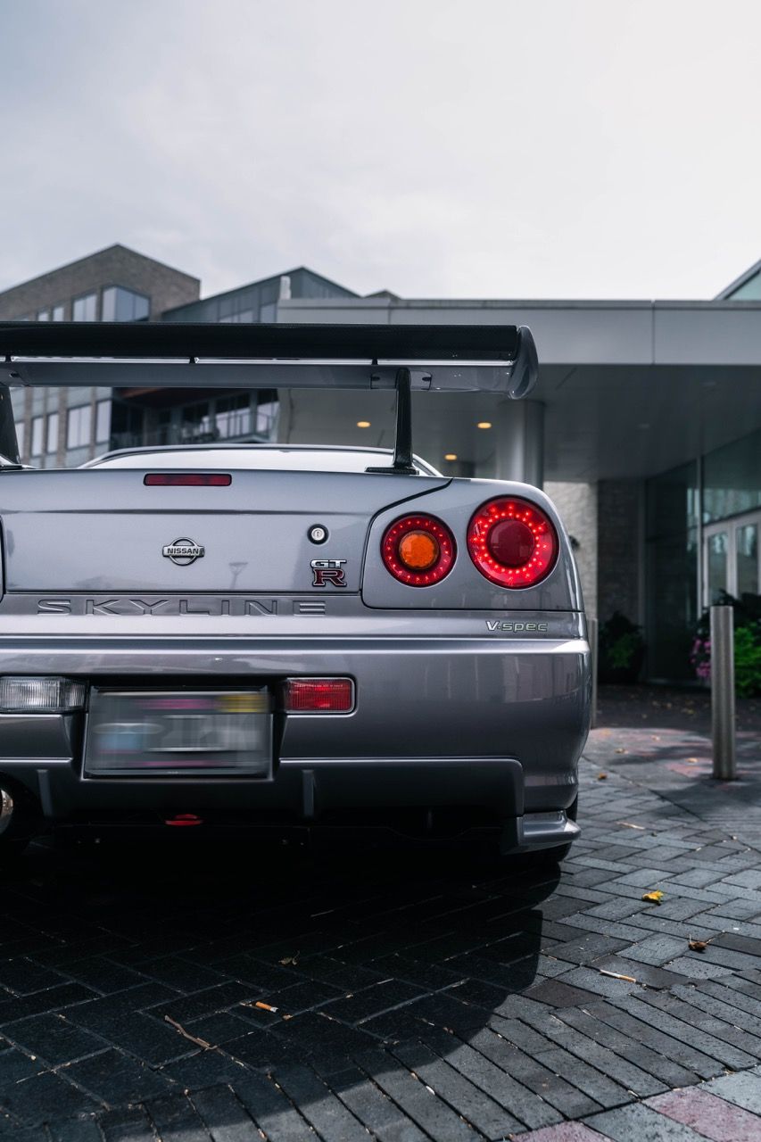 R34 GTR with Motivo Forged CS-E custom wheels in frozen brushed gunmetal face and gloss polished clear lip side view — view 23