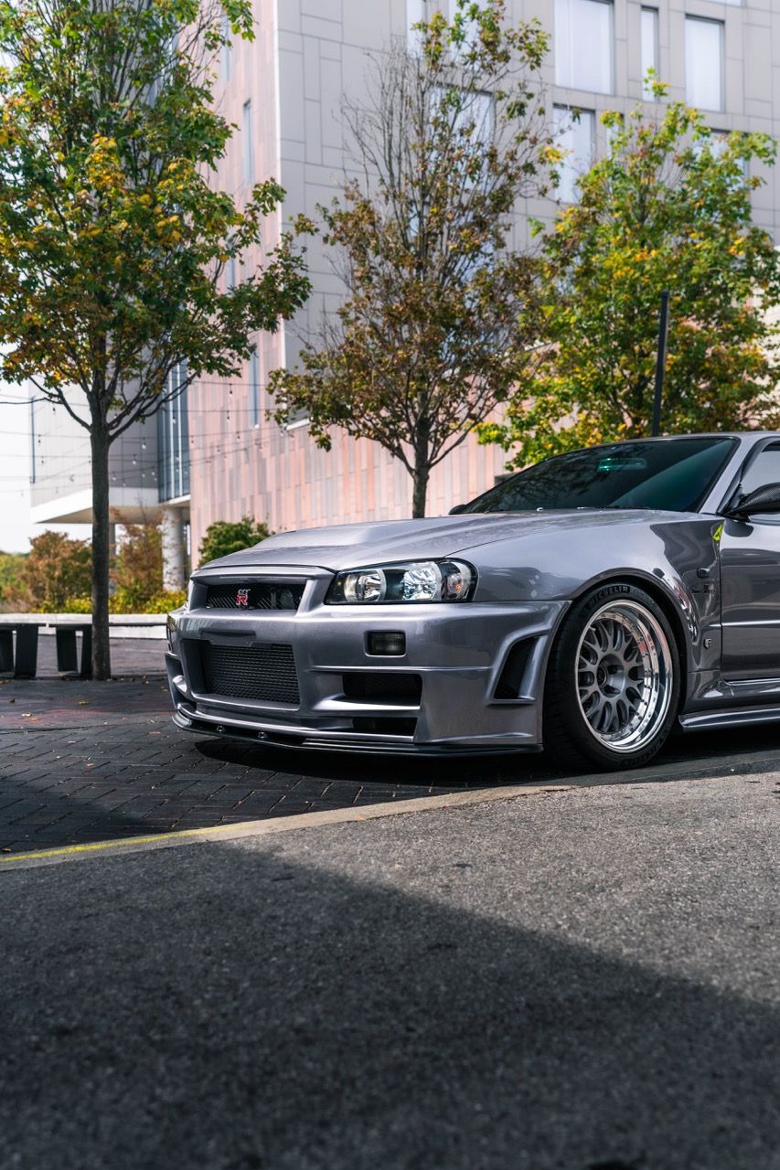 R34 GTR with Motivo Forged CS-E custom wheels in frozen brushed gunmetal face and gloss polished clear lip side view — view 41