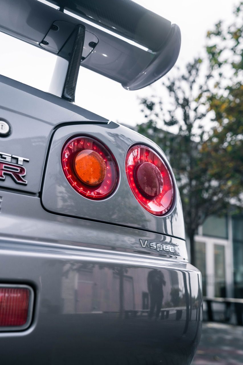 R34 GTR with Motivo Forged CS-E custom wheels in frozen brushed gunmetal face and gloss polished clear lip side view — view 29