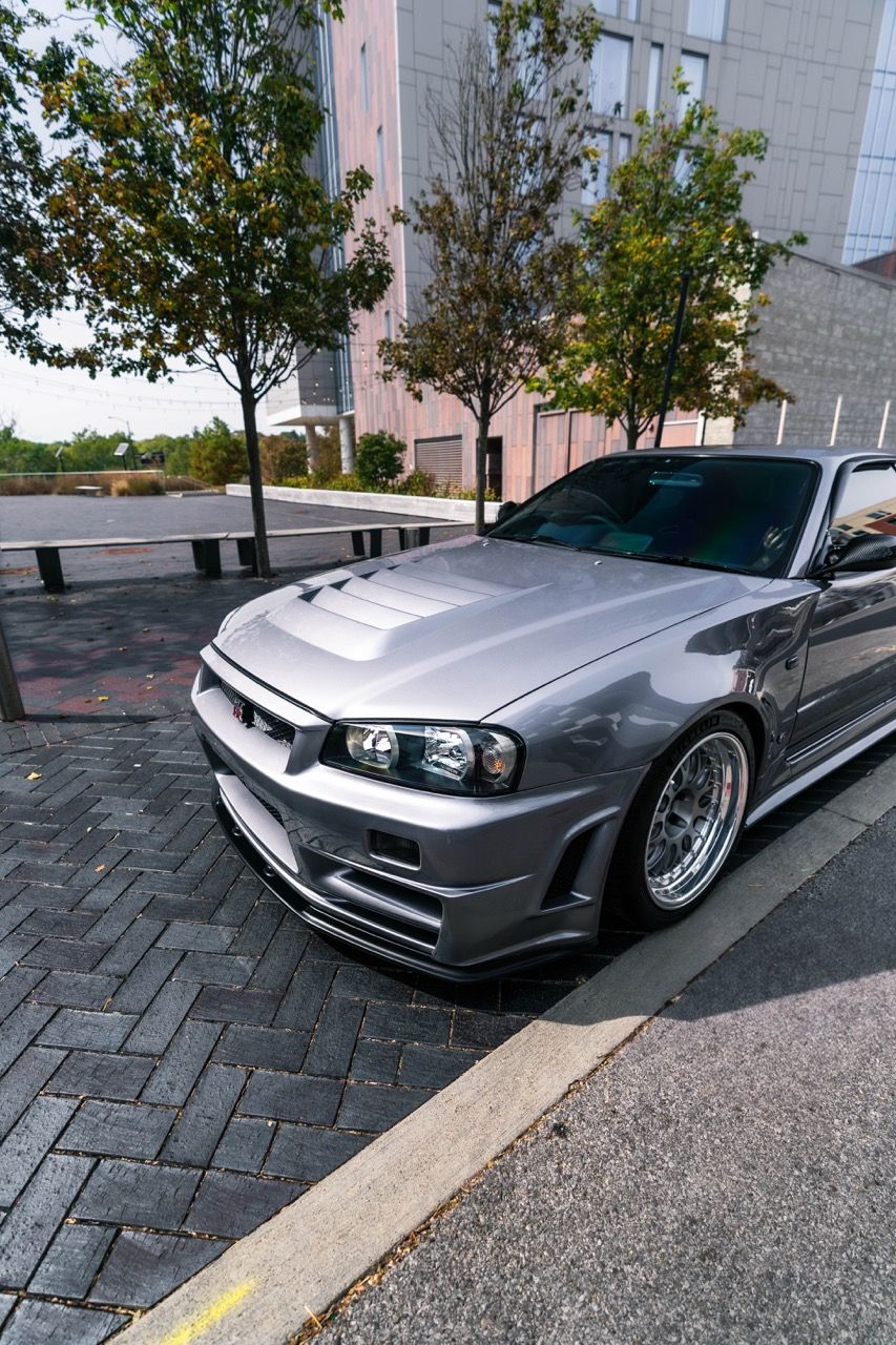 R34 GTR with Motivo Forged CS-E custom wheels in frozen brushed gunmetal face and gloss polished clear lip side view — view 43