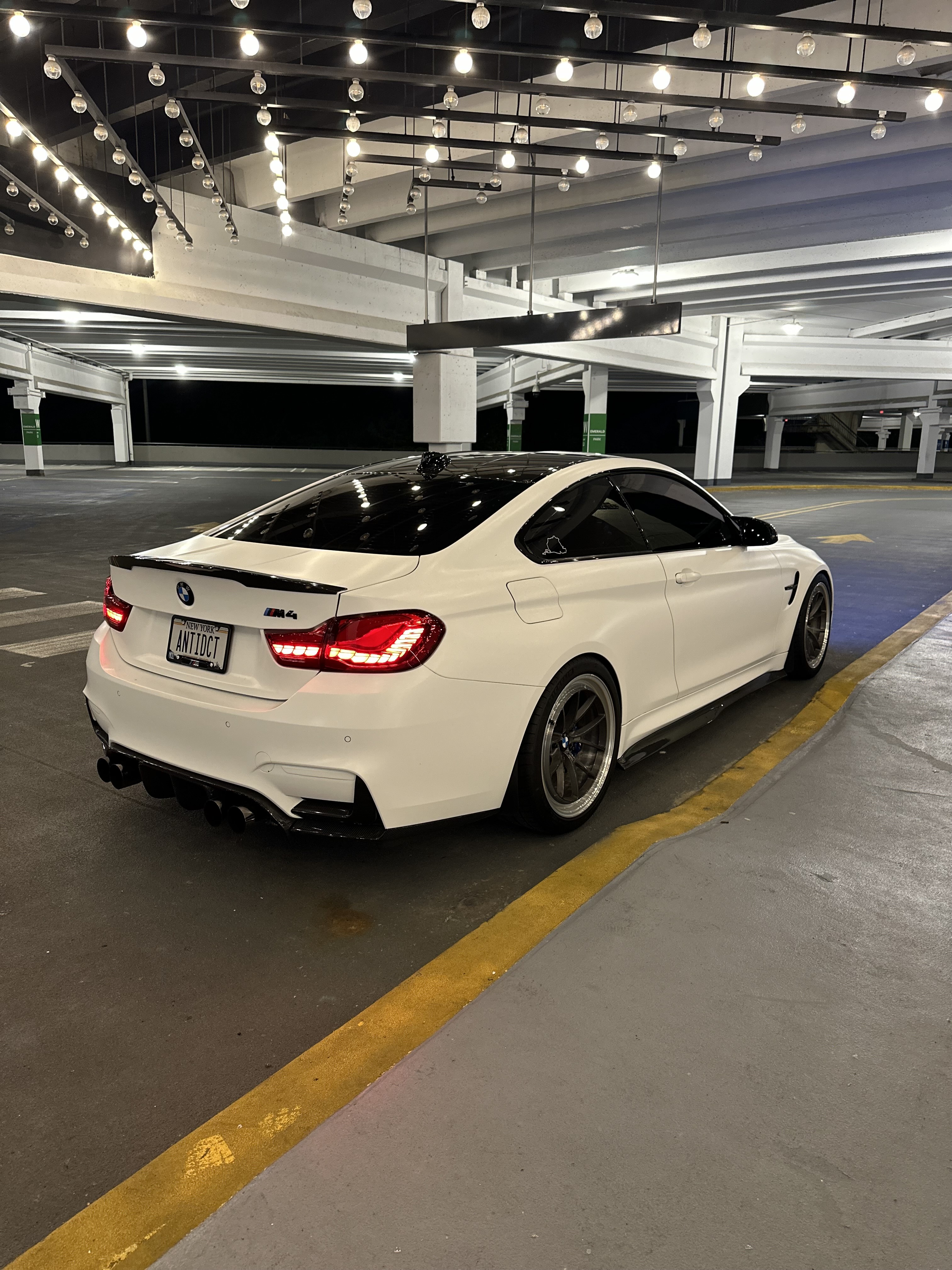 BMW M4 F82 with Motivo Forged MB-C Comp Spec custom wheels in gloss brushed gunmetal face and gloss polished clear lip side view — view 6