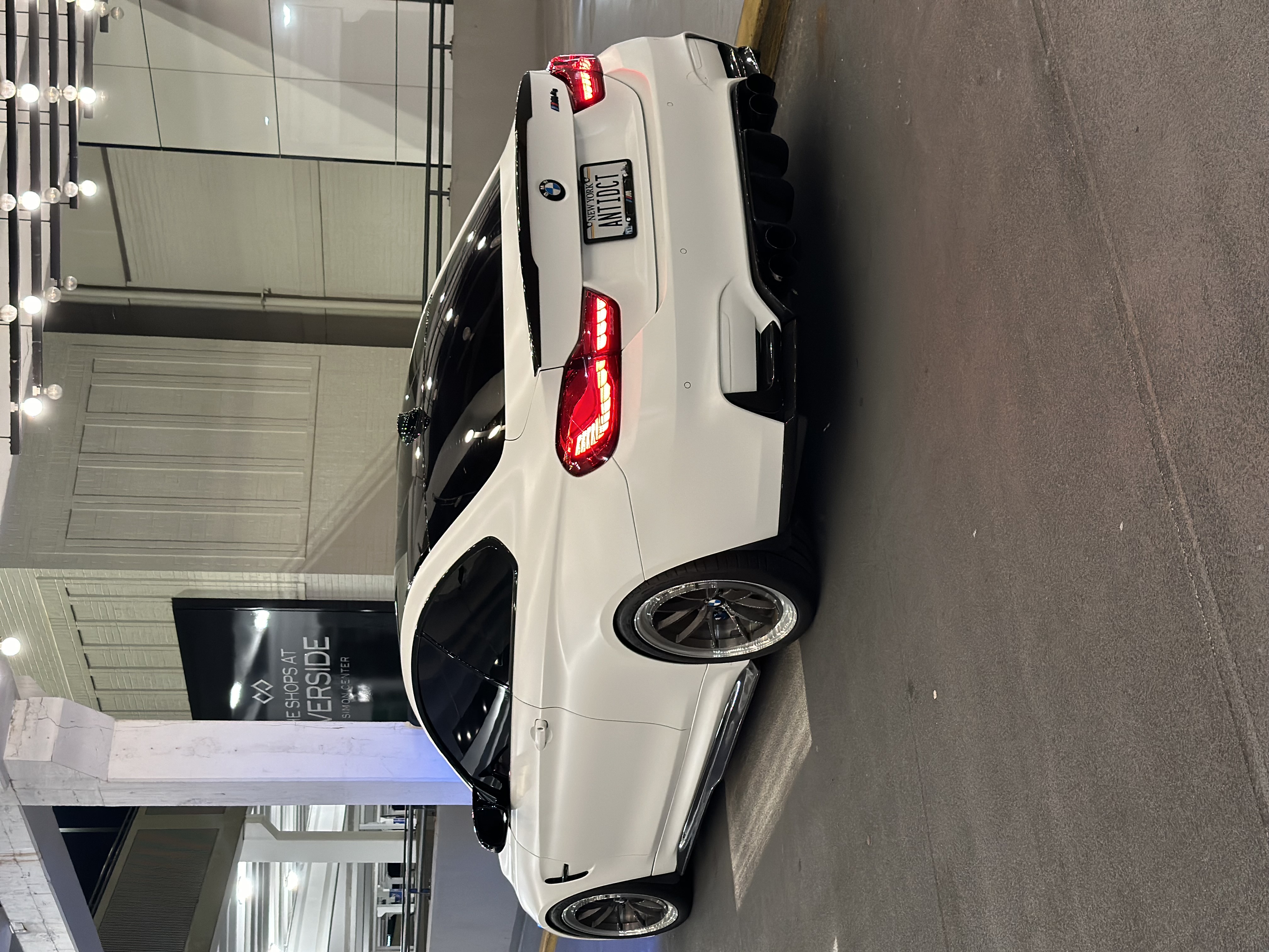 BMW M4 F82 with Motivo Forged MB-C Comp Spec custom wheels in gloss brushed gunmetal face and gloss polished clear lip side view — view 2
