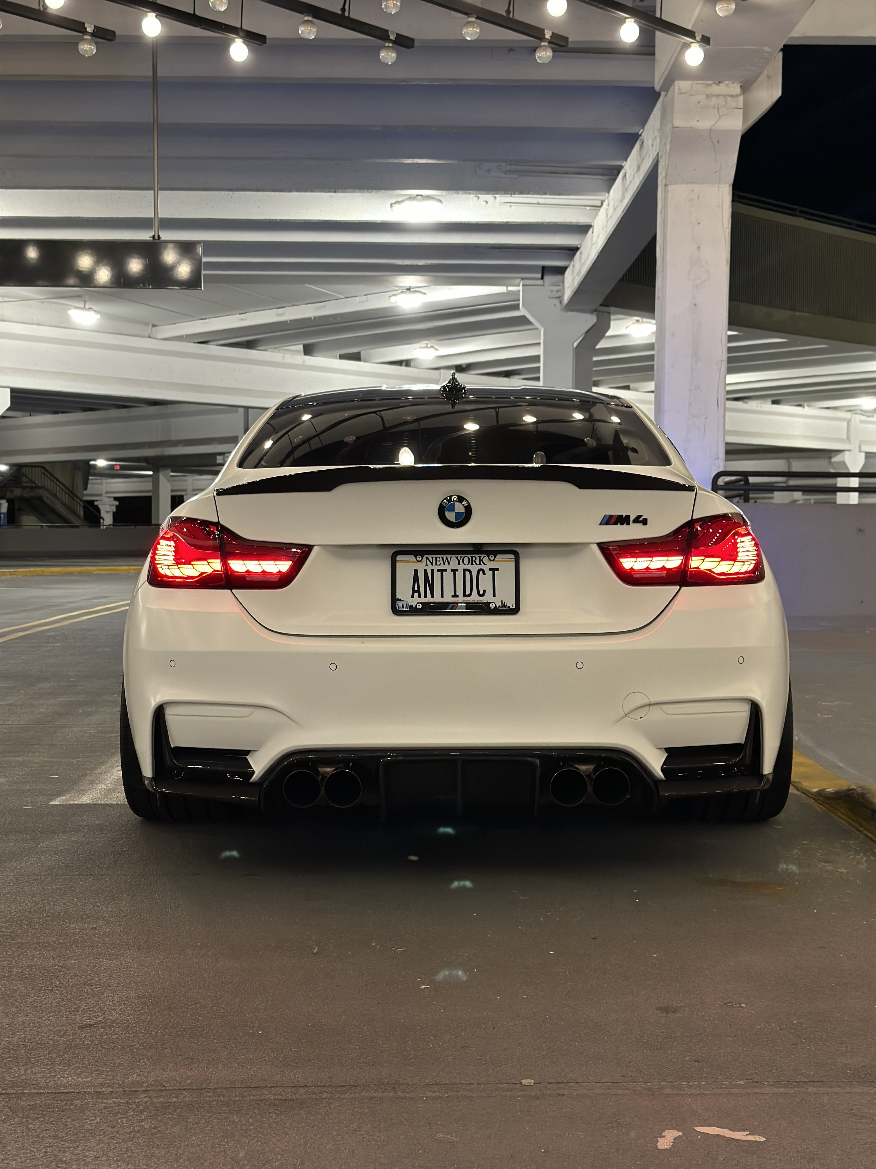 BMW M4 F82 with Motivo Forged MB-C Comp Spec custom wheels in gloss brushed gunmetal face and gloss polished clear lip side view — view 8