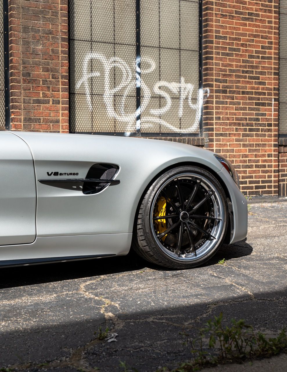 Mercedes-Benz AMG GTR with Motivo Forged CS-N custom wheels in frozen black face and gloss polished clear lip front half side view