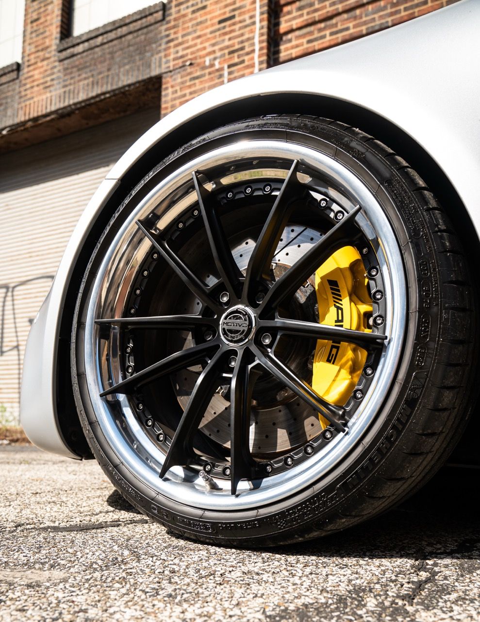 Mercedes-Benz AMG GTR with Motivo Forged CS-N custom wheels in frozen black face and gloss polished clear lip wheel low view
