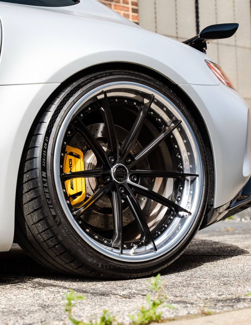 Mercedes-Benz AMG GTR with Motivo Forged CS-N custom wheels in frozen black face and gloss polished clear lip rear wheel view