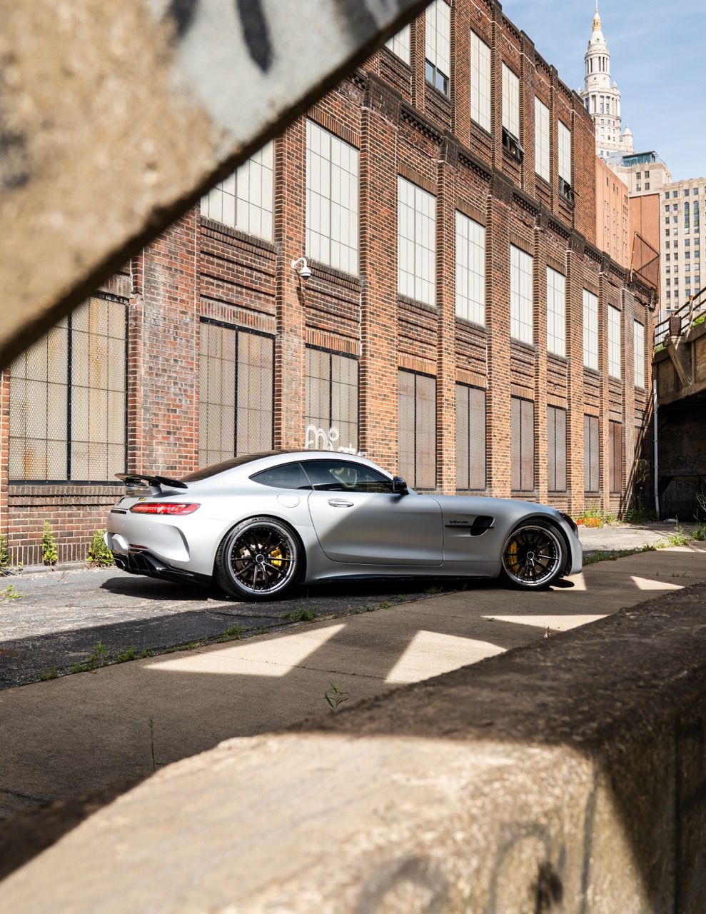 Mercedes-Benz AMG GTR with Motivo Forged CS-N custom wheels in frozen black face and gloss polished clear lip rear side view