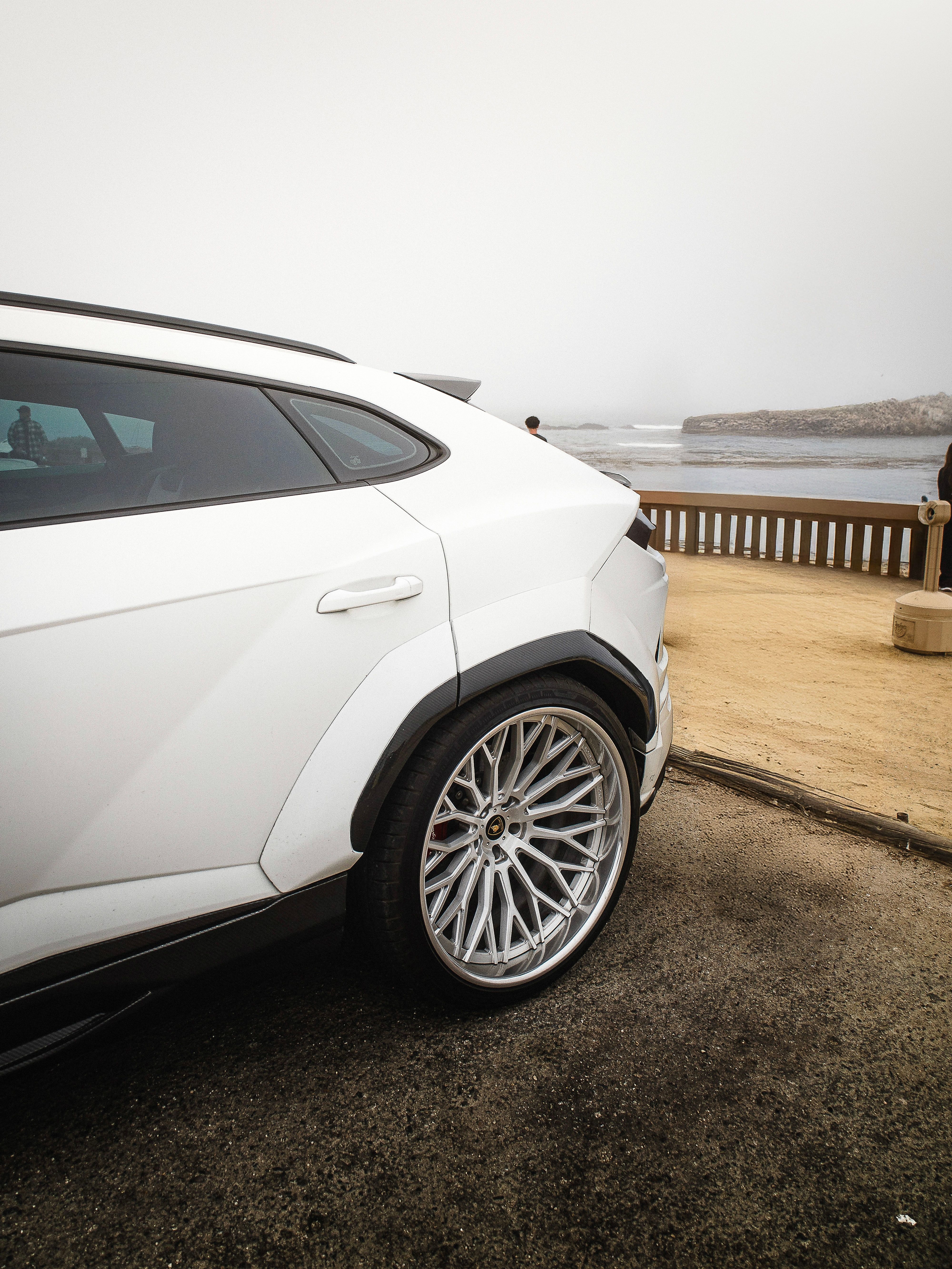 Lamborghini Urus with Motivo Forged CS-S custom wheels in gloss brushed clear face and gloss polished clear lip side view — view 4