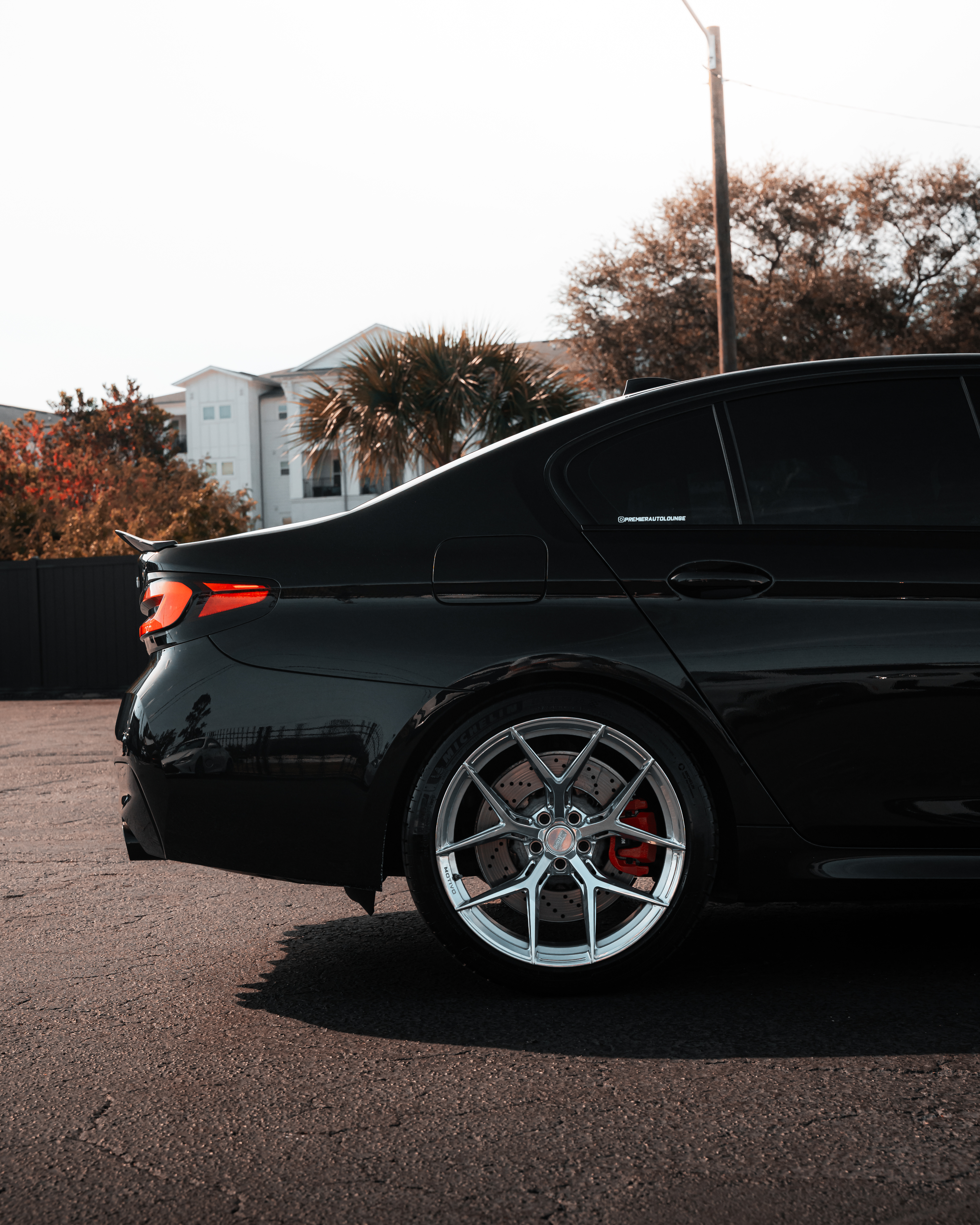 F90 BMW M5 LCI with Motivo Forged MB-H custom wheels in gloss polished clear finish side view — view 4