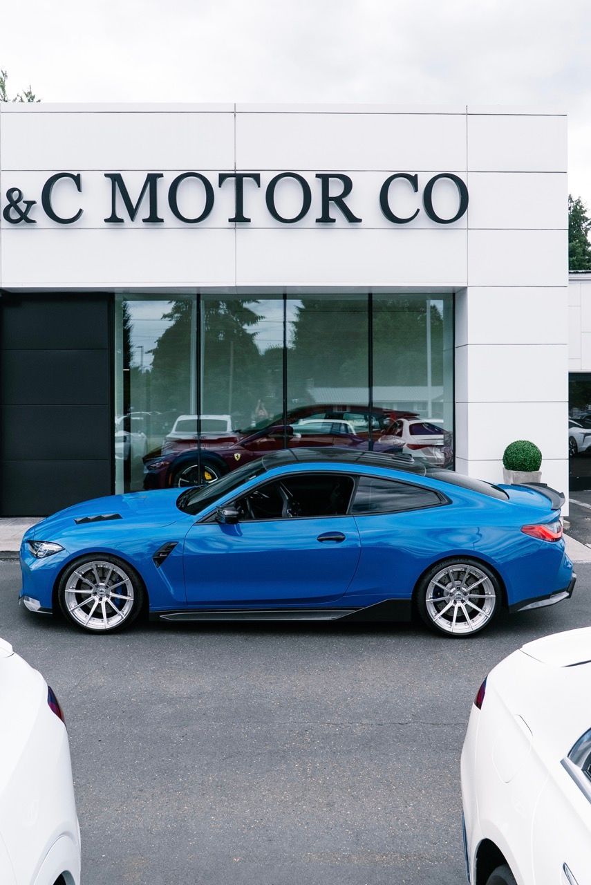 BMW M4 with Motivo Forged CS-U custom wheels in gloss polished clear face and brushed clear barrel side view