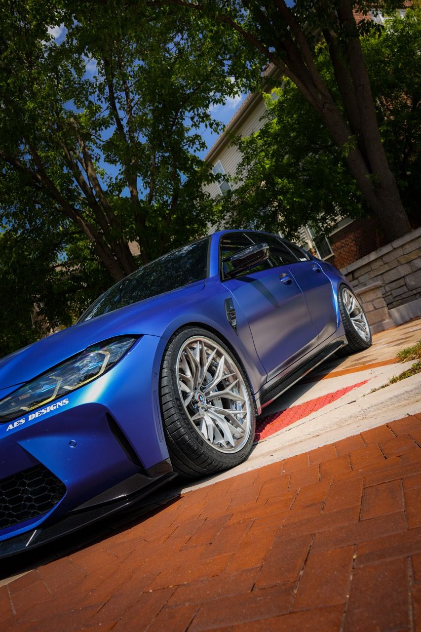 BMW M3 G80 with Motivo Forged CS-J custom wheels in gloss brushed clear face and gloss polished clear front side view — view 9
