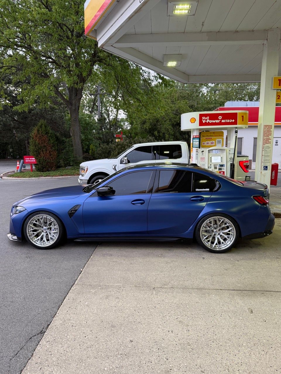BMW M3 G80 with Motivo Forged CS-J custom wheels in gloss brushed clear face and gloss polished clear front side view — view 2