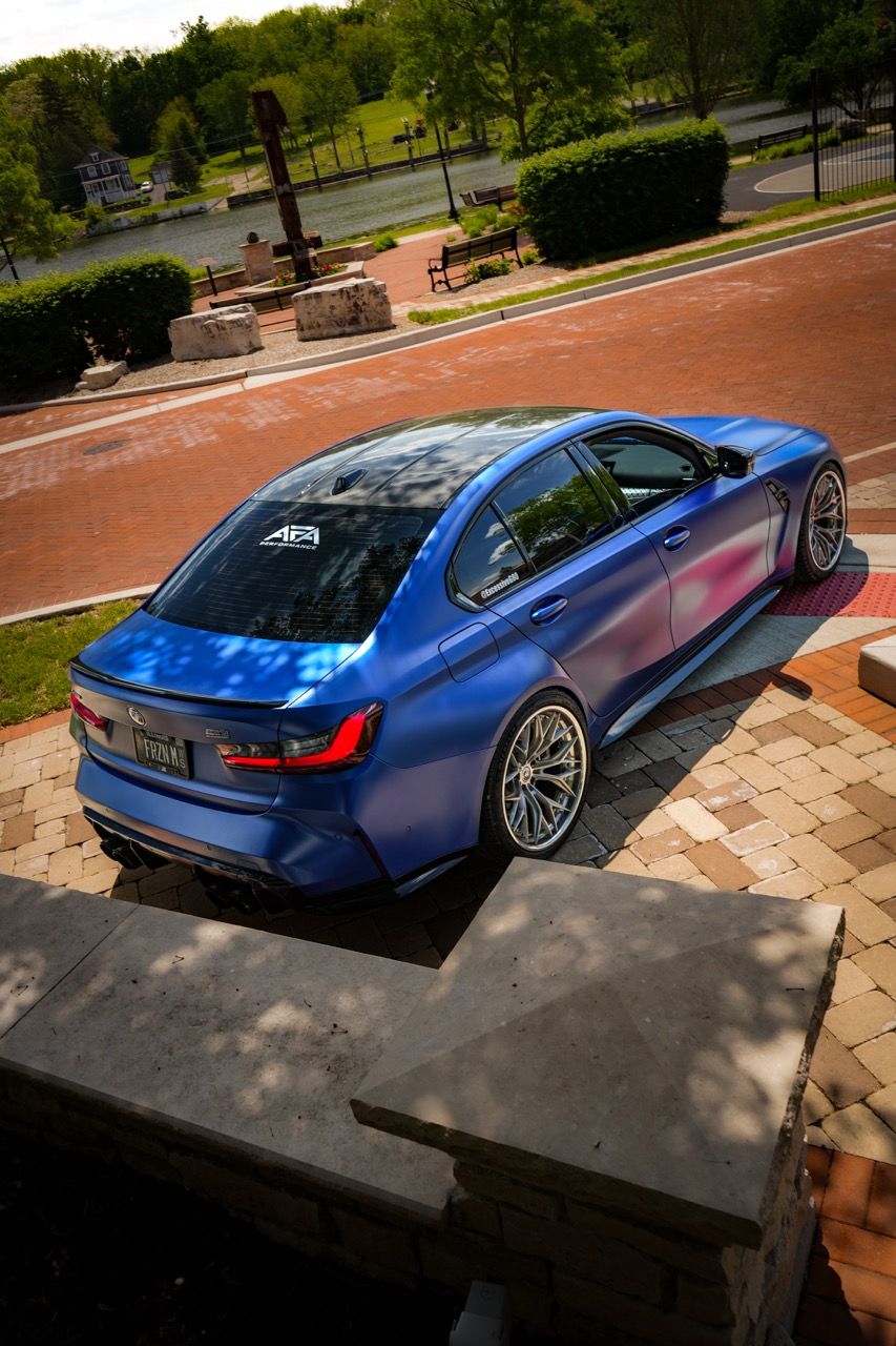 BMW M3 G80 with Motivo Forged CS-J custom wheels in gloss brushed clear face and gloss polished clear front side view — view 5