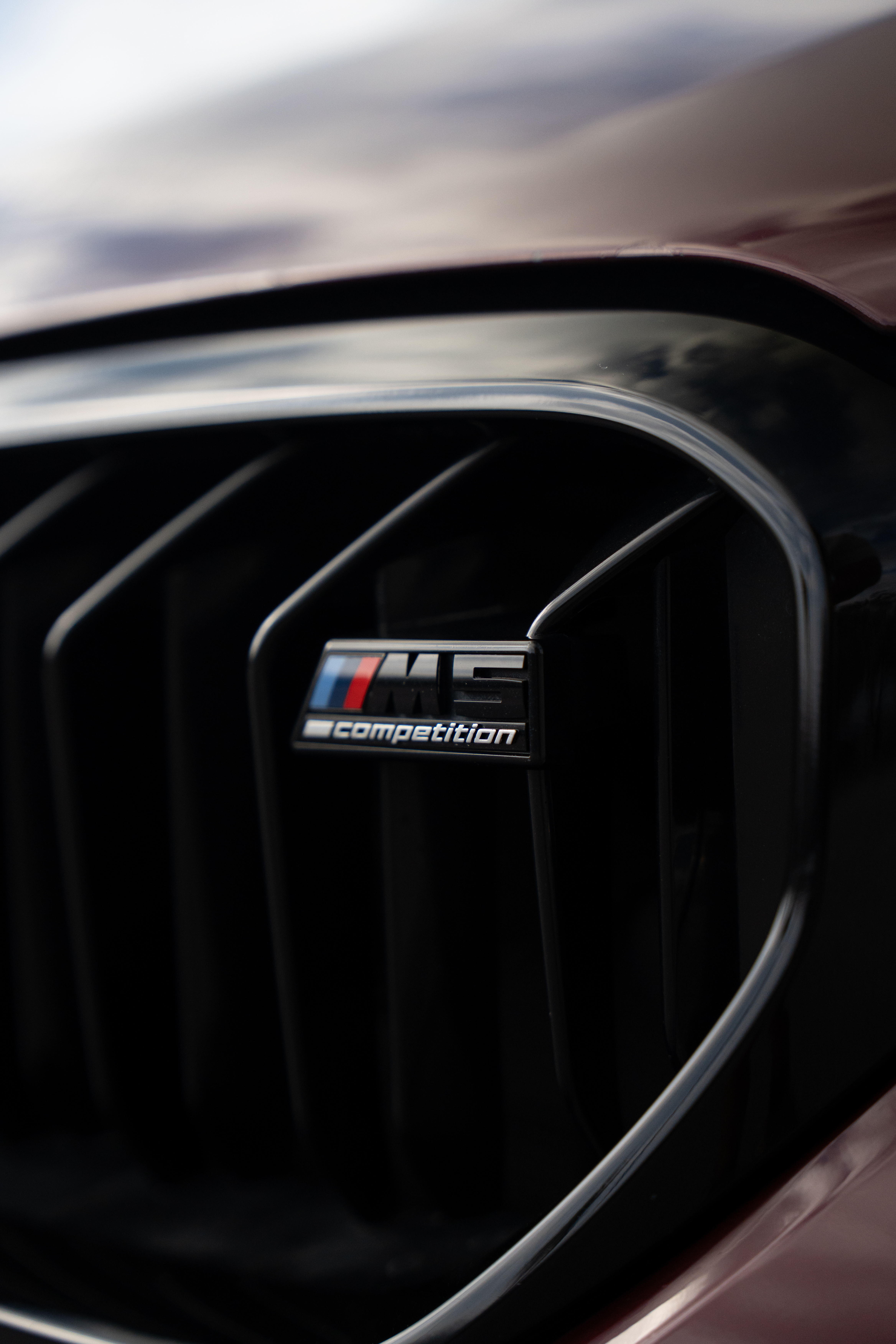 F90 BMW M5 LCI with Motivo Forged MB-E custom wheels in gloss brushed clear finish front side view — view 9
