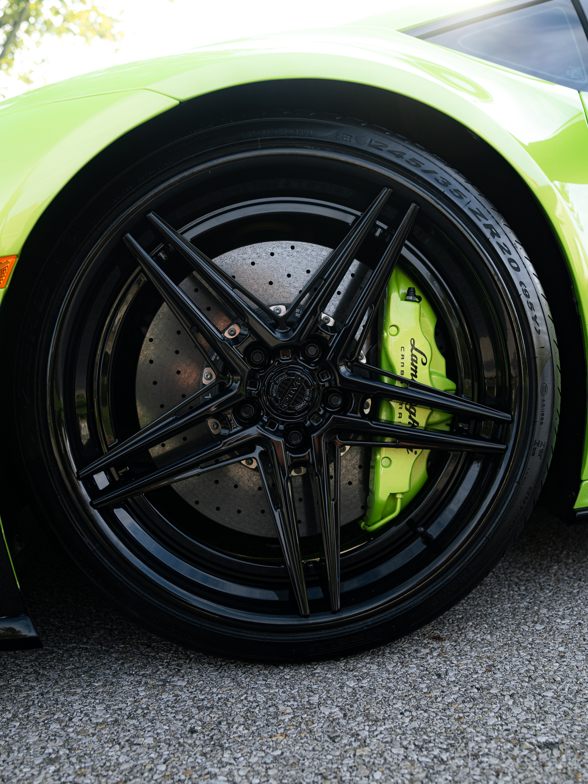 2023 Lamborghini Huracan with Motivo Forged CS-D custom wheels in gloss black and gloss black detail view