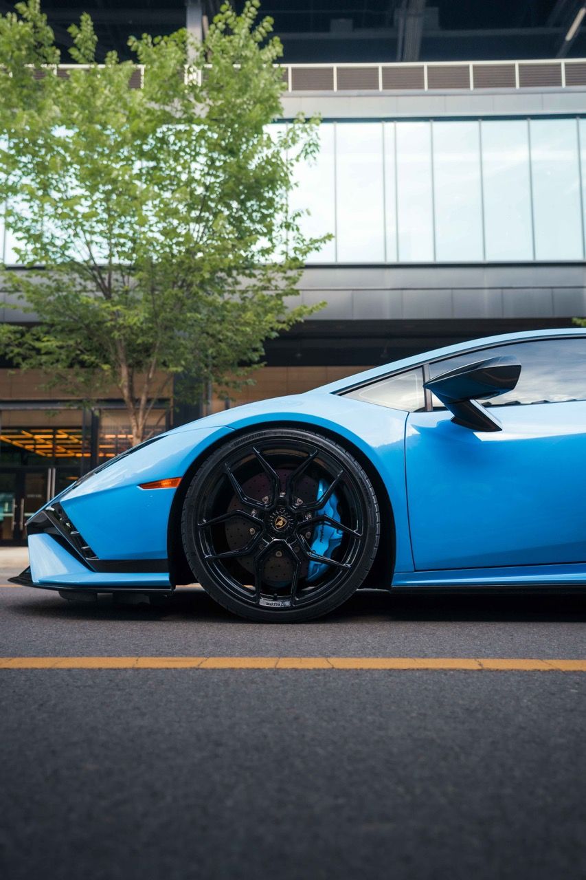 Lamborghini Huracan Tecnica with Motivo Forged MB-L custom wheels in gloss black face front half side view