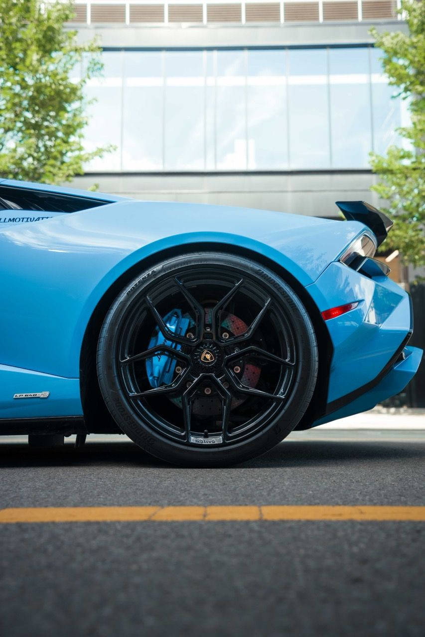 Lamborghini Huracan Tecnica with Motivo Forged MB-L custom wheels in gloss black face rear half side view