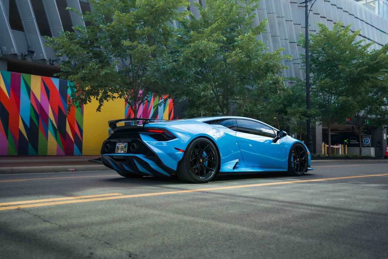 Lamborghini Huracan Tecnica with Motivo Forged MB-L custom wheels in gloss black face rear side view
