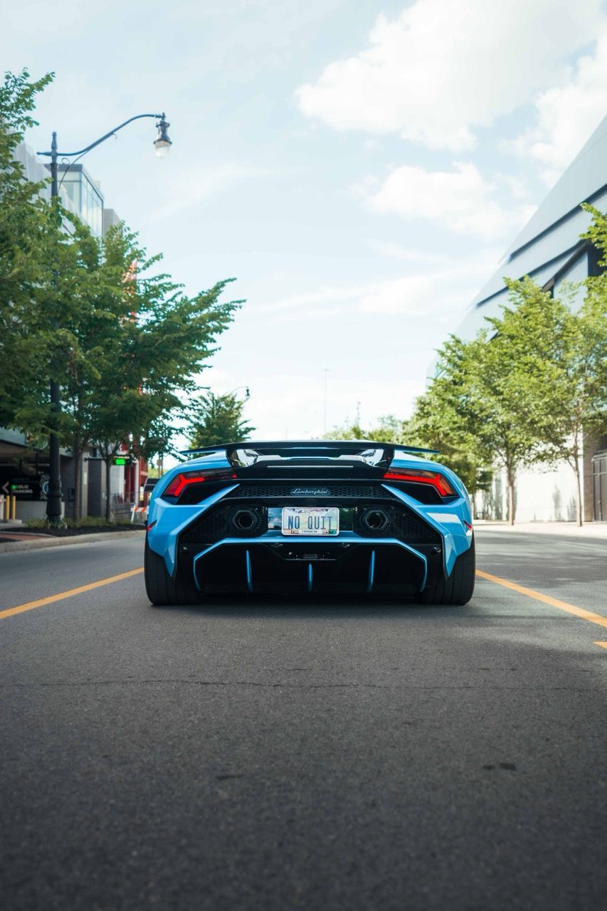 Lamborghini Huracan Tecnica with Motivo Forged MB-L custom wheels in gloss black rear view