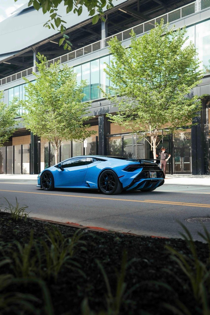 Lamborghini Huracan Tecnica with Motivo Forged MB-L custom wheels in gloss black face rear side view