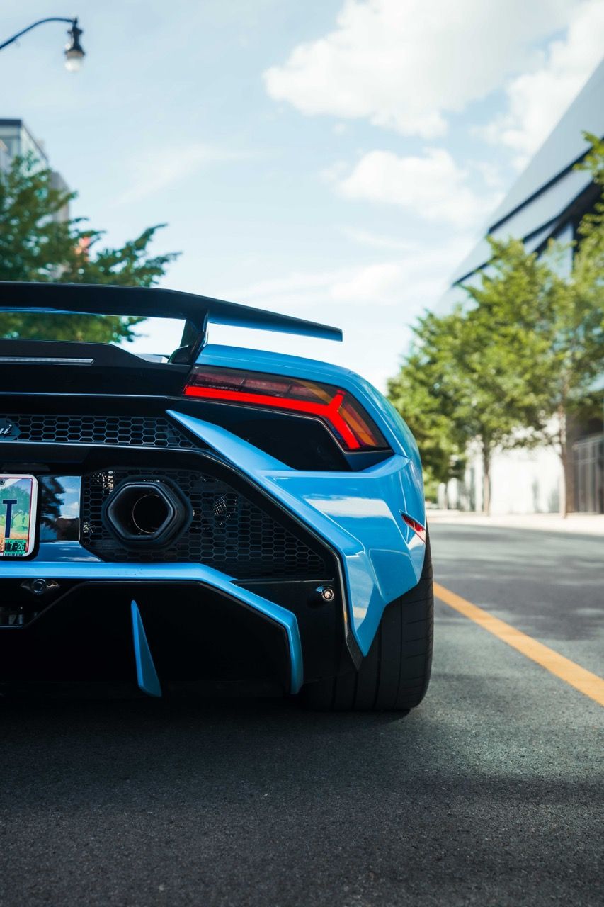 Lamborghini Huracan Tecnica with Motivo Forged MB-L custom wheels in gloss black rear half view