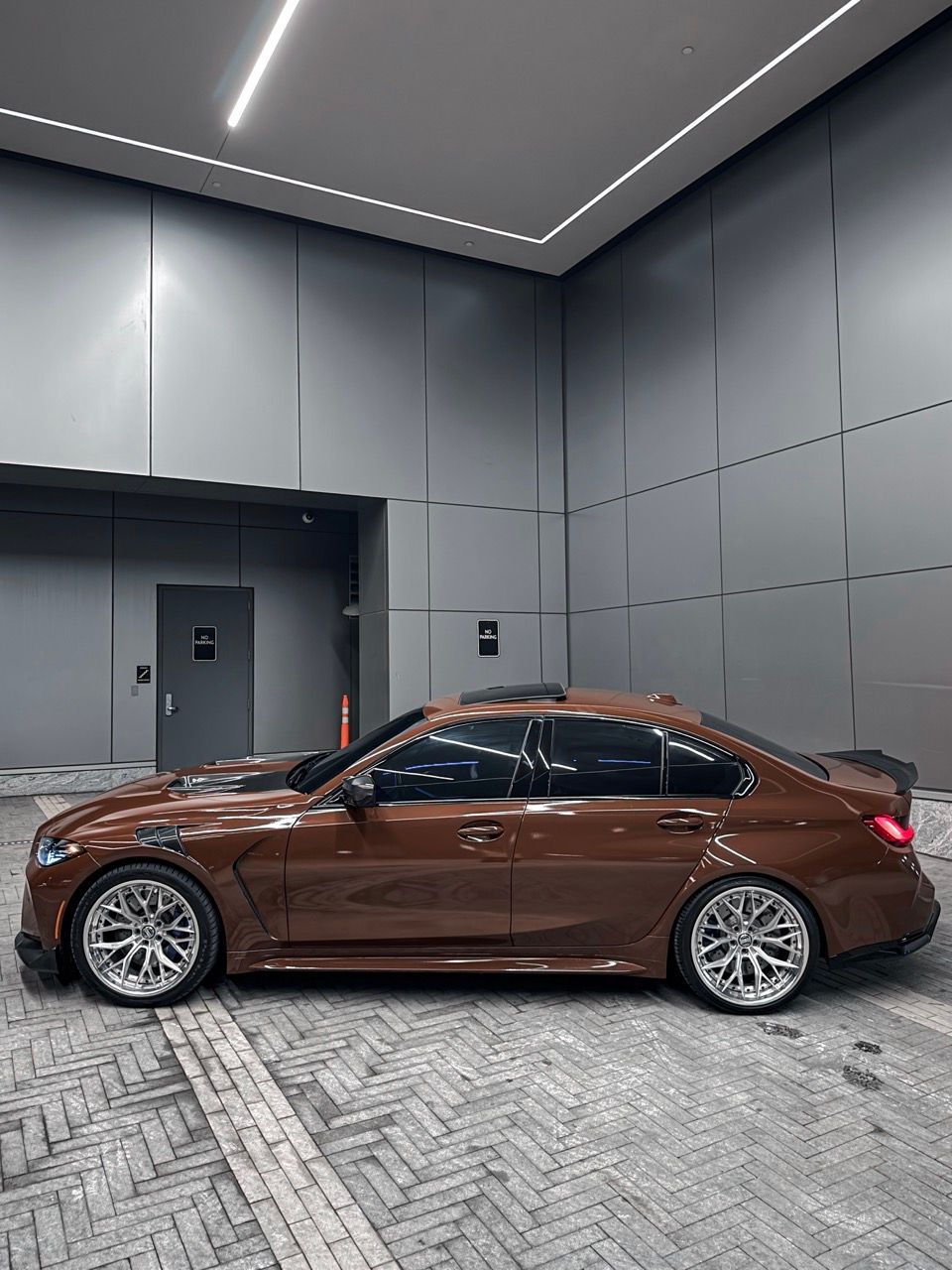 BMW M3 G80 with Motivo Forged CS-J custom wheels in gloss brushed clear face and gloss polished clear side view